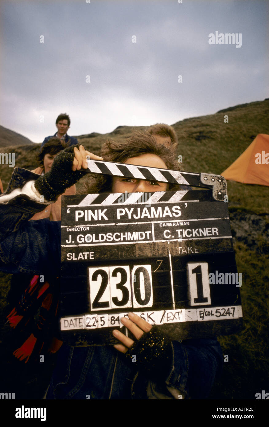 film crew holding clapper board for the film pink pyjamas 1984 1984 Stock Photo