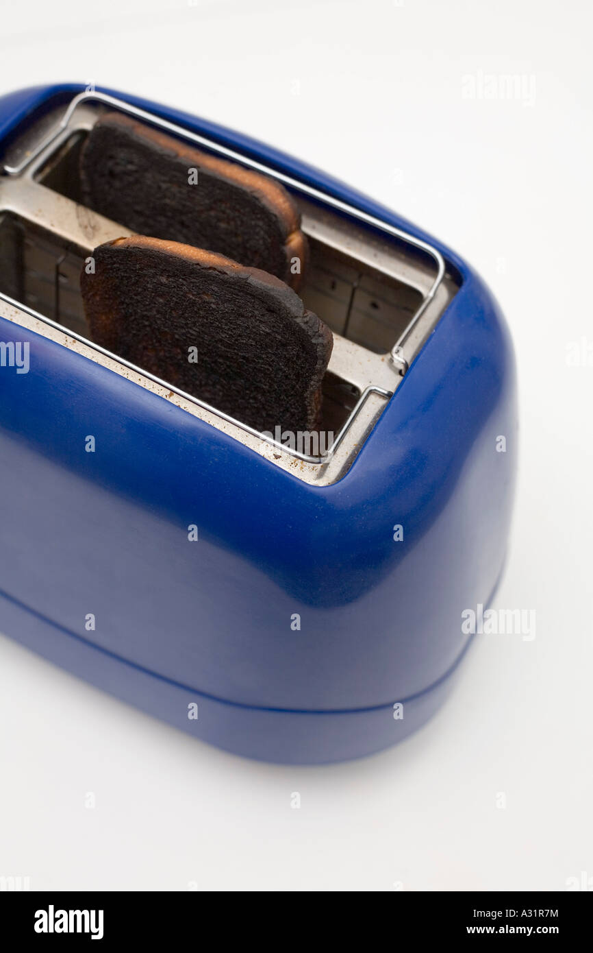 Burnt Toast In Blue Toaster Burnt Toast In Blue Toaster