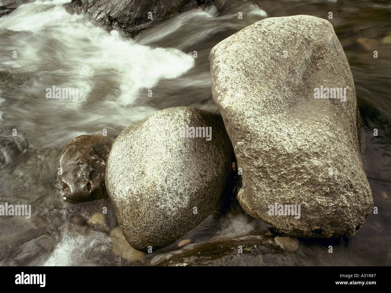 rocks worn smooth by fast flowing water Stock Photo