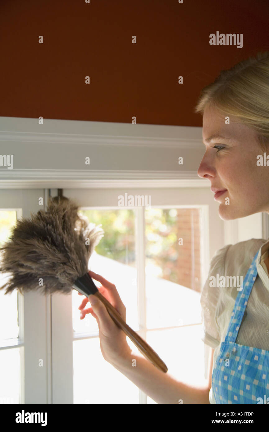 Woman single cleaning duster High Resolution Stock Photography and ...