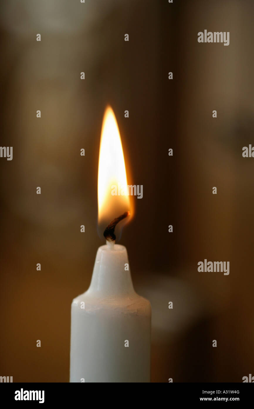 Close up of a candle burning Stock Photo - Alamy