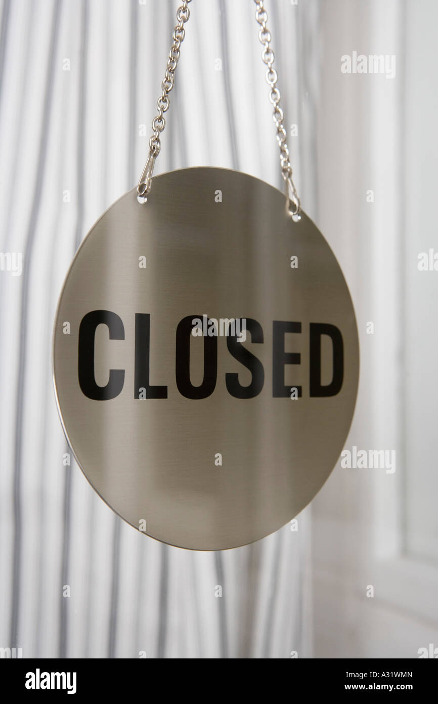 Closed sign in window Stock Photo - Alamy