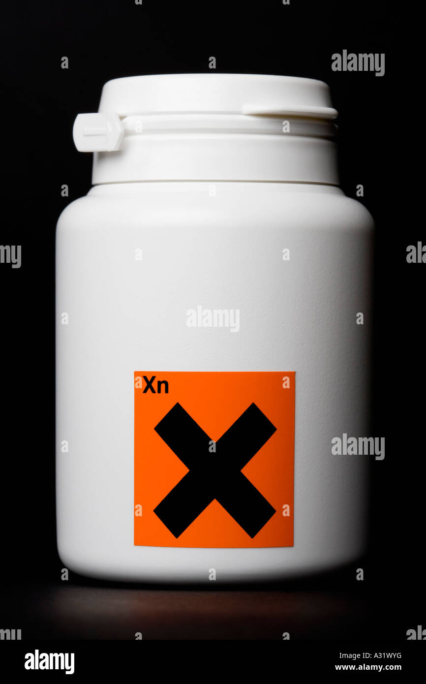 White bottle with harmful effects warning label Stock Photo Alamy