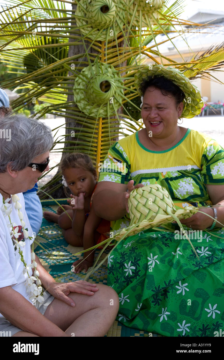 Weaving a hat Takapoto Tuamotu Islands French Polynesia Editorial use only Stock Photo