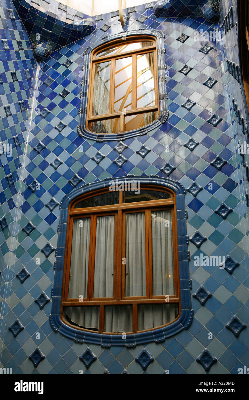 Detail of tiles and windows in central stairwell of Casa Batllo, Barcelona Stock Photo