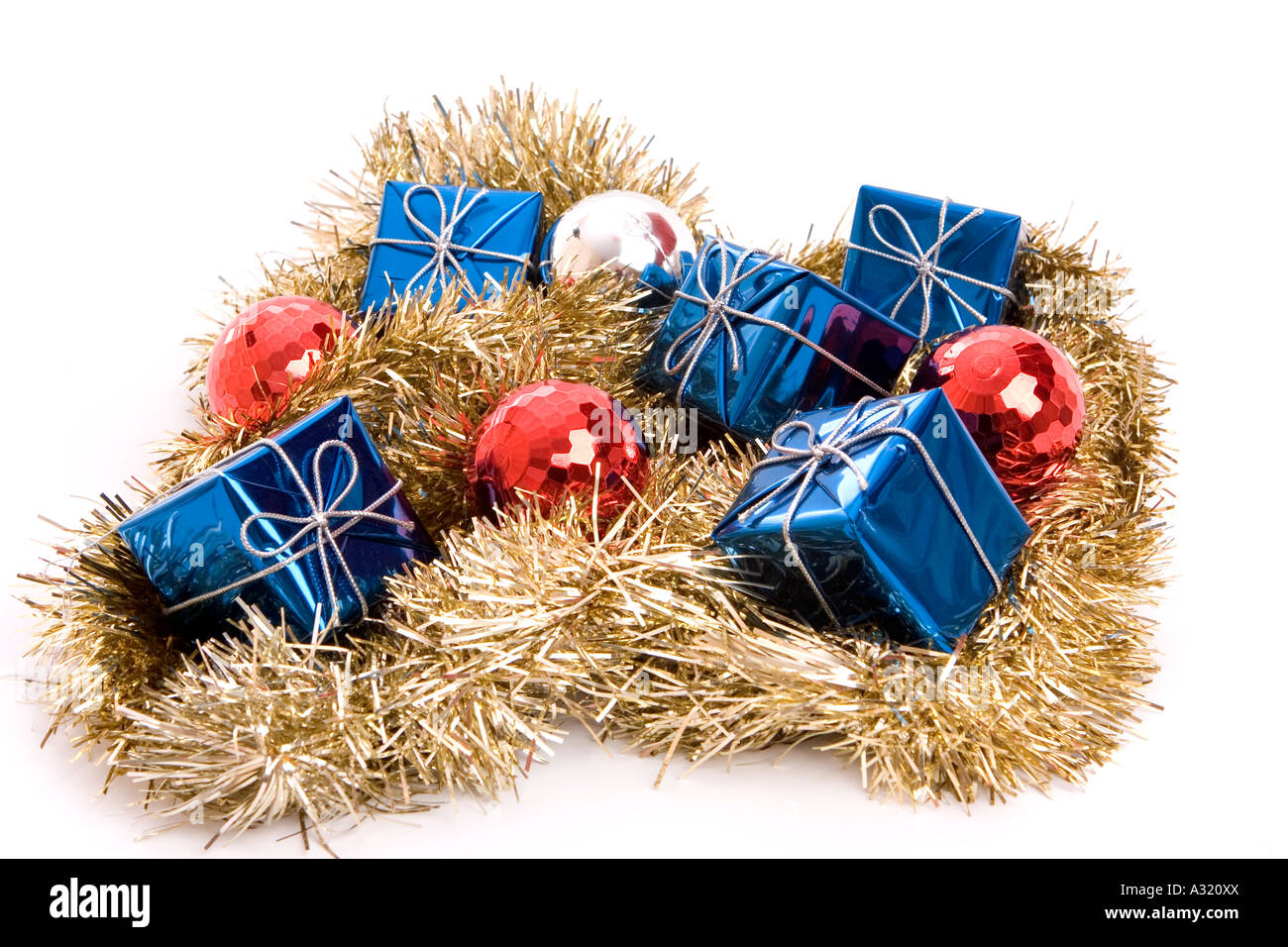 Christmas present on tinsel Stock Photo