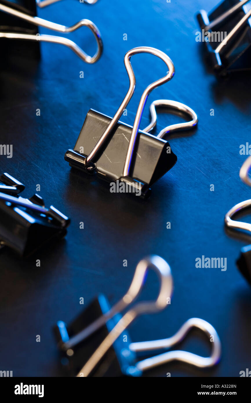 Binder clips on a desk Stock Photo Alamy