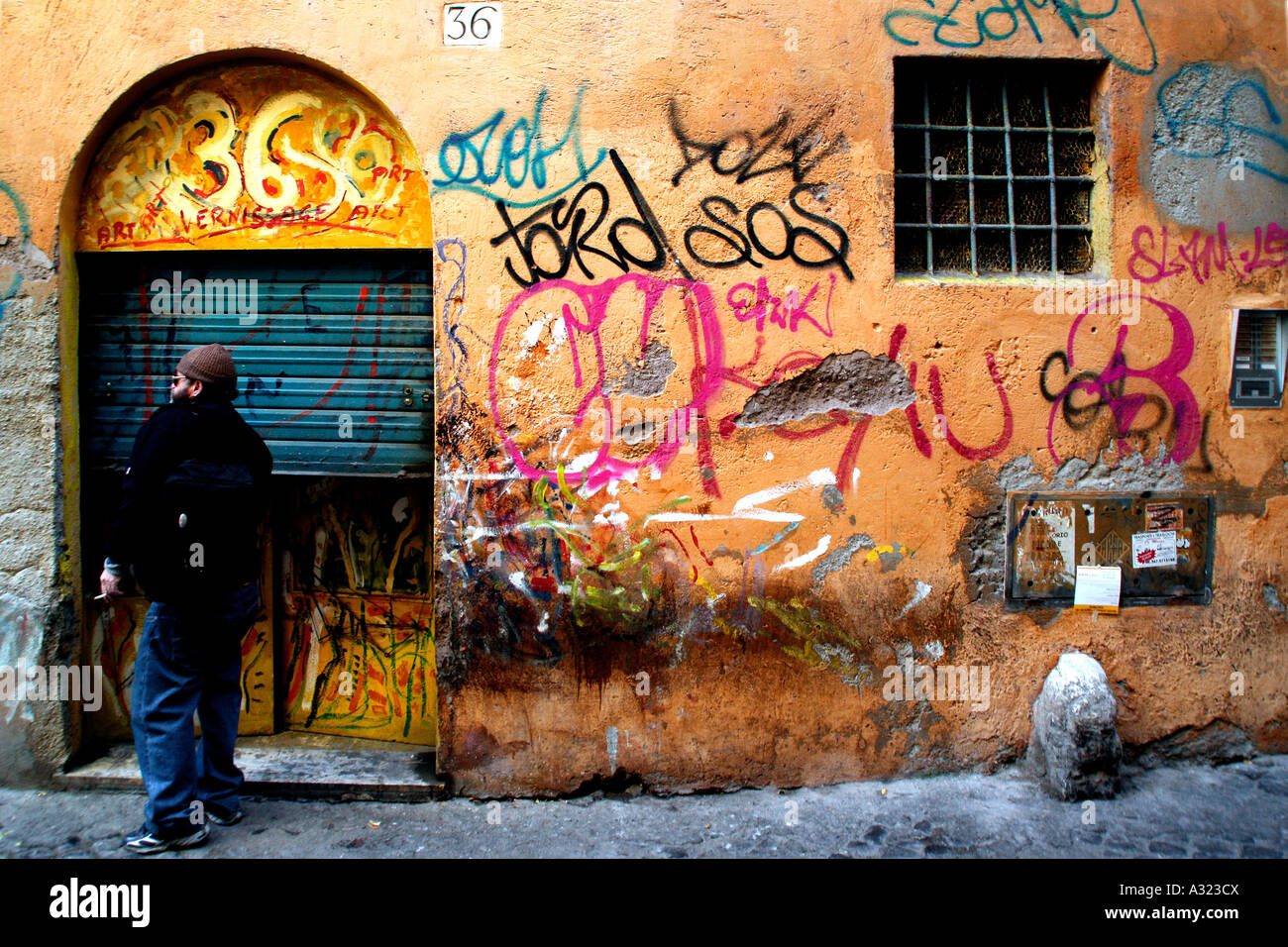 Shop front covered by graffiti hi-res stock photography and images - Alamy