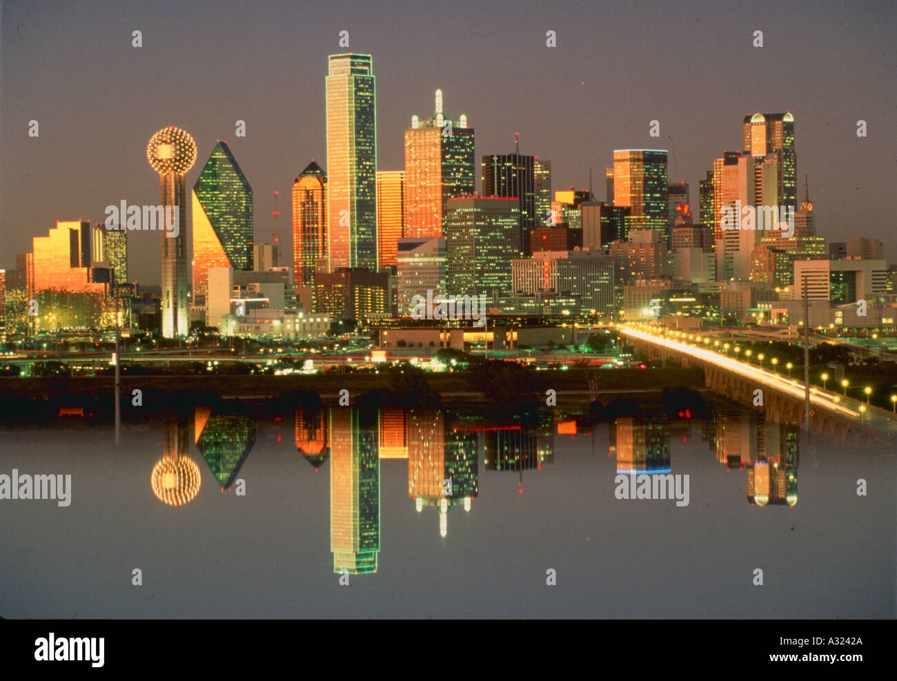 Dallas skyline at dusk with reflections on water Stock Photo - Alamy
