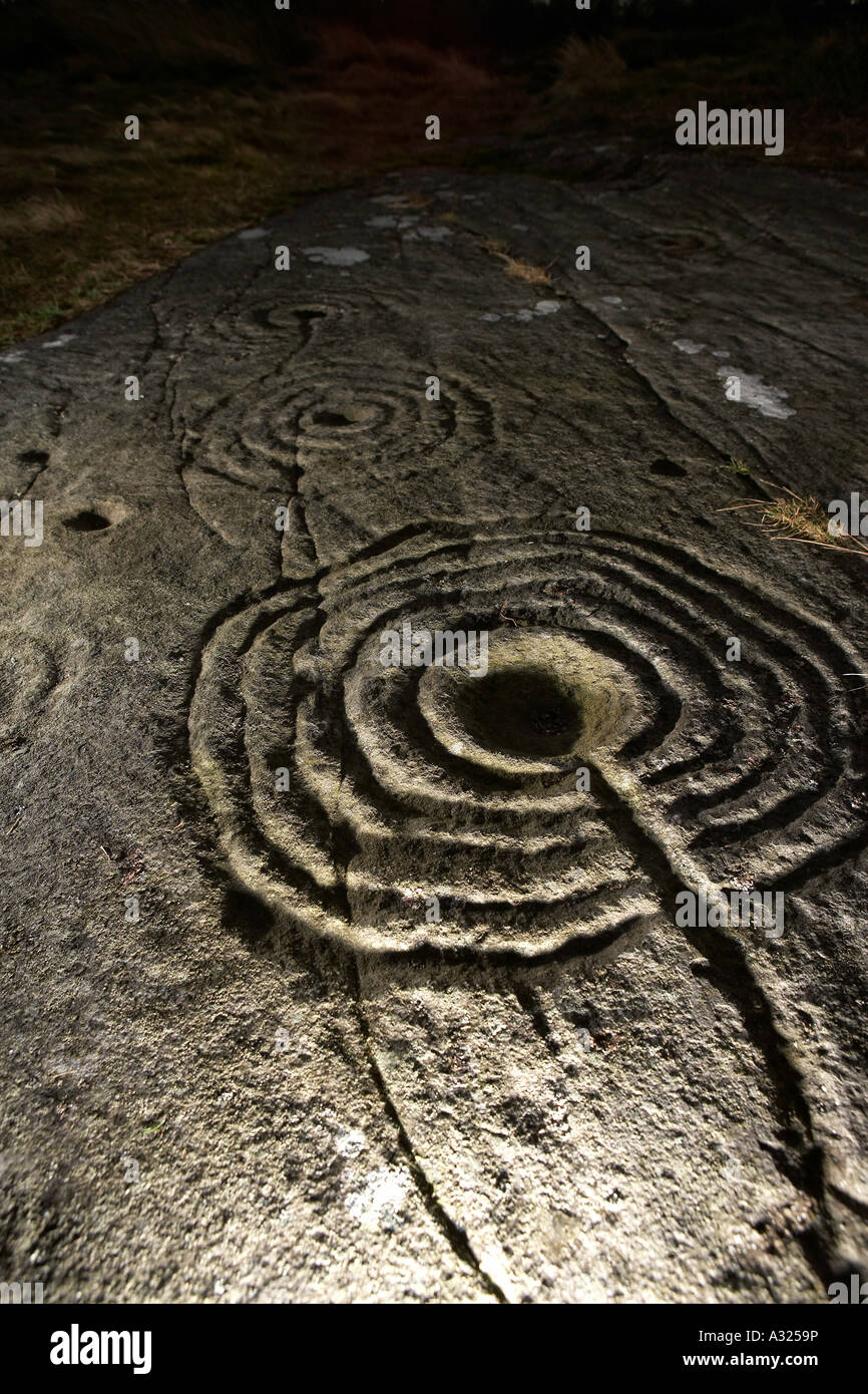 Cup and ring marked rocks Prehistoric rock art Weetwood Moor near Wooler Stock Photo