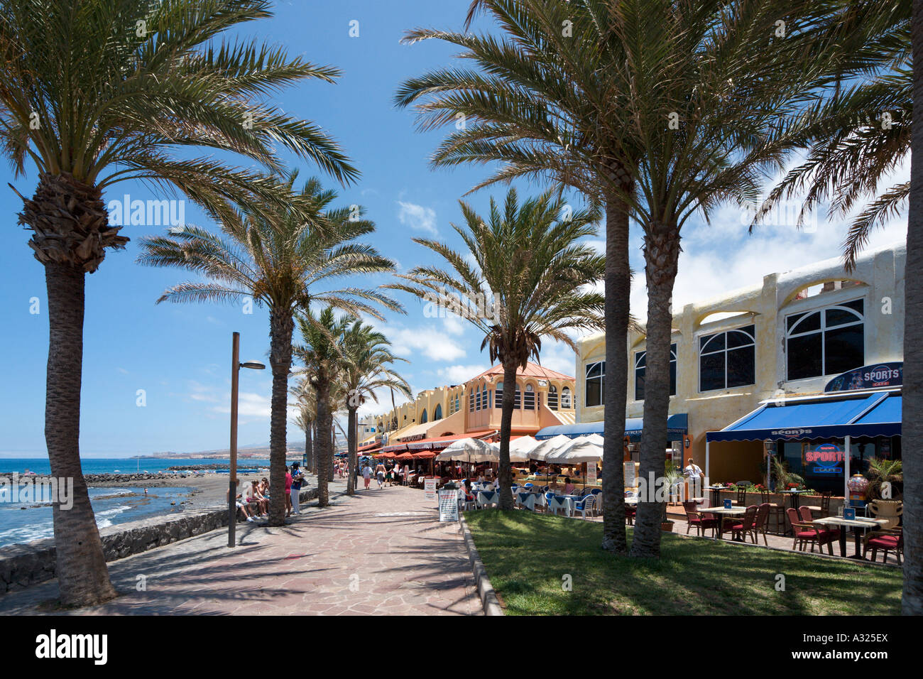 Seafront shops & cafes at Las Veronicas shopping and entertainment complex, Playa de las Americas, Tenerife, Canary Islands Stock Photo