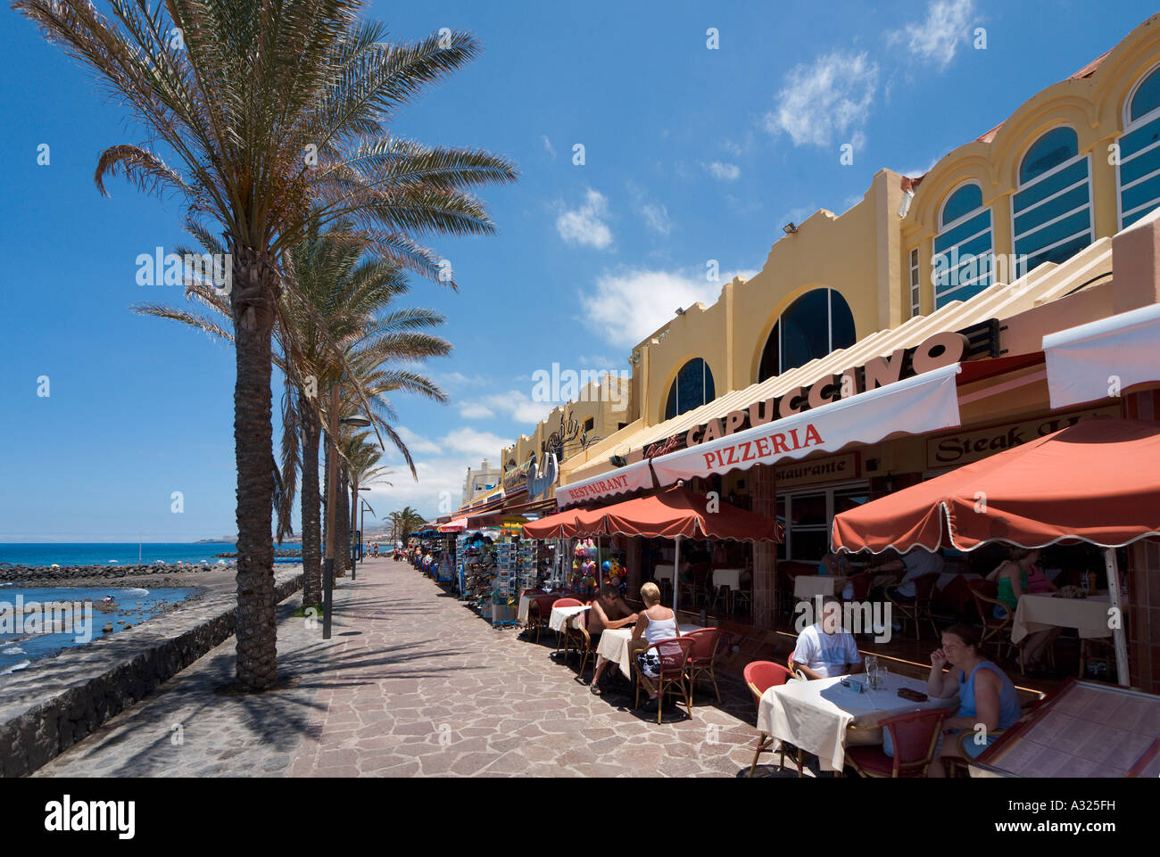 Seafront restaurants at Las Veronicas shopping and entertainment complex, Playa de las Americas, Tenerife, Canary Islands, Spain Stock Photo