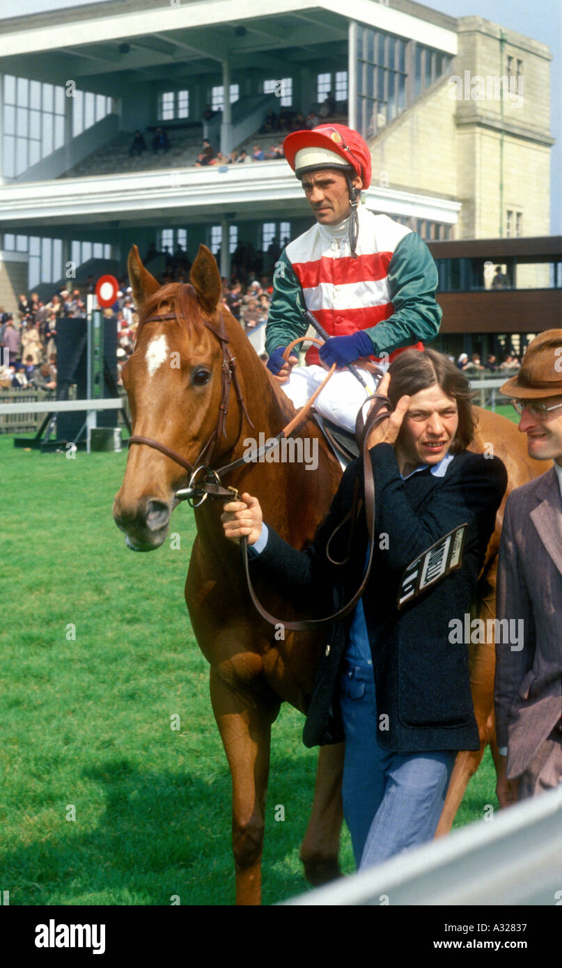 Vintage late 1970s UK Newmarket Racecourse Mordella and jockey going to the 1 000 Guineas start  Stock Photo