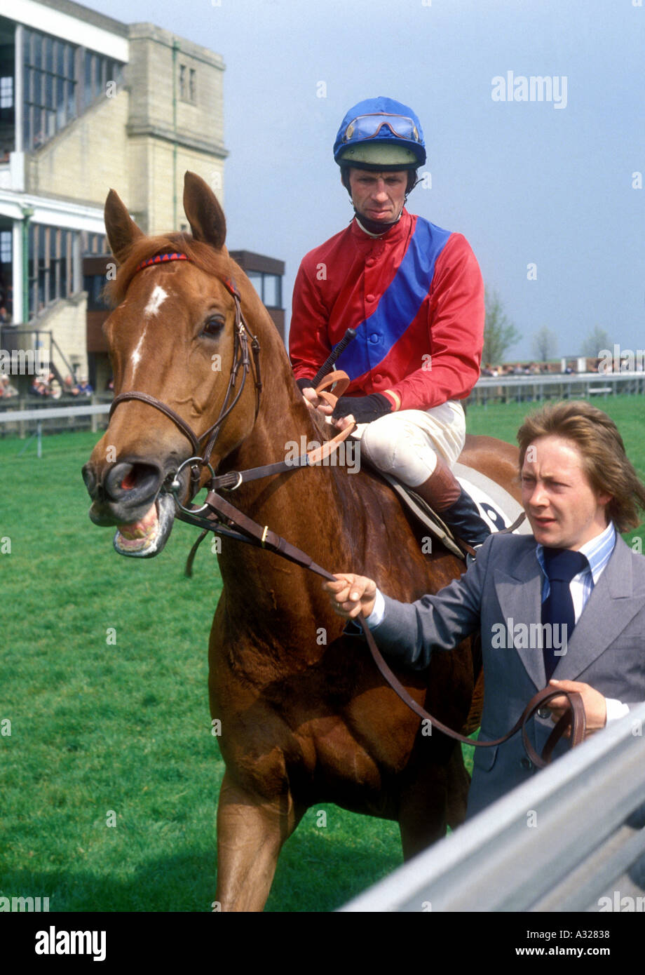 Vintage late 1970s UK Newmarket Racecourse Jockey Edward Hide going to the start  Stock Photo