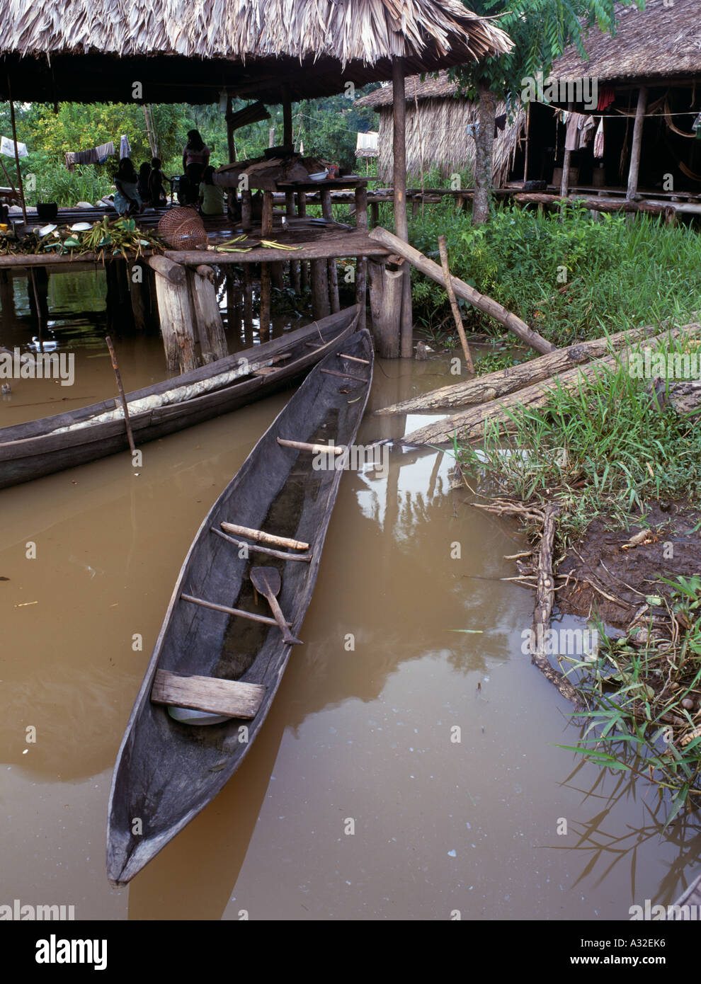 Hollowed out log made into navigable boat in Warao village people of the water Orinoco Delta Venezuela South America Stock Photo