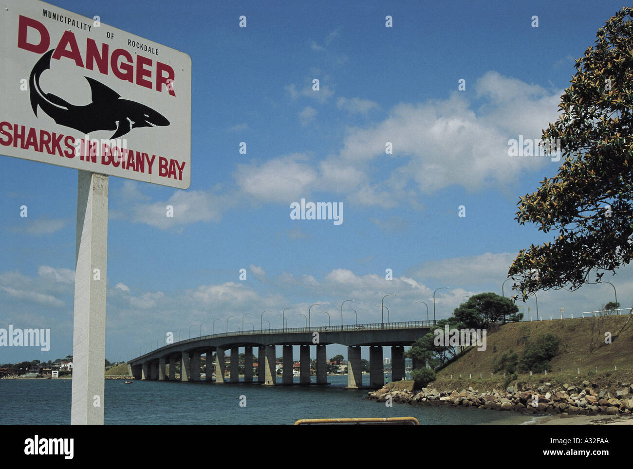 Captain Cook bridge with shark warning notice Sydney Stock Photo