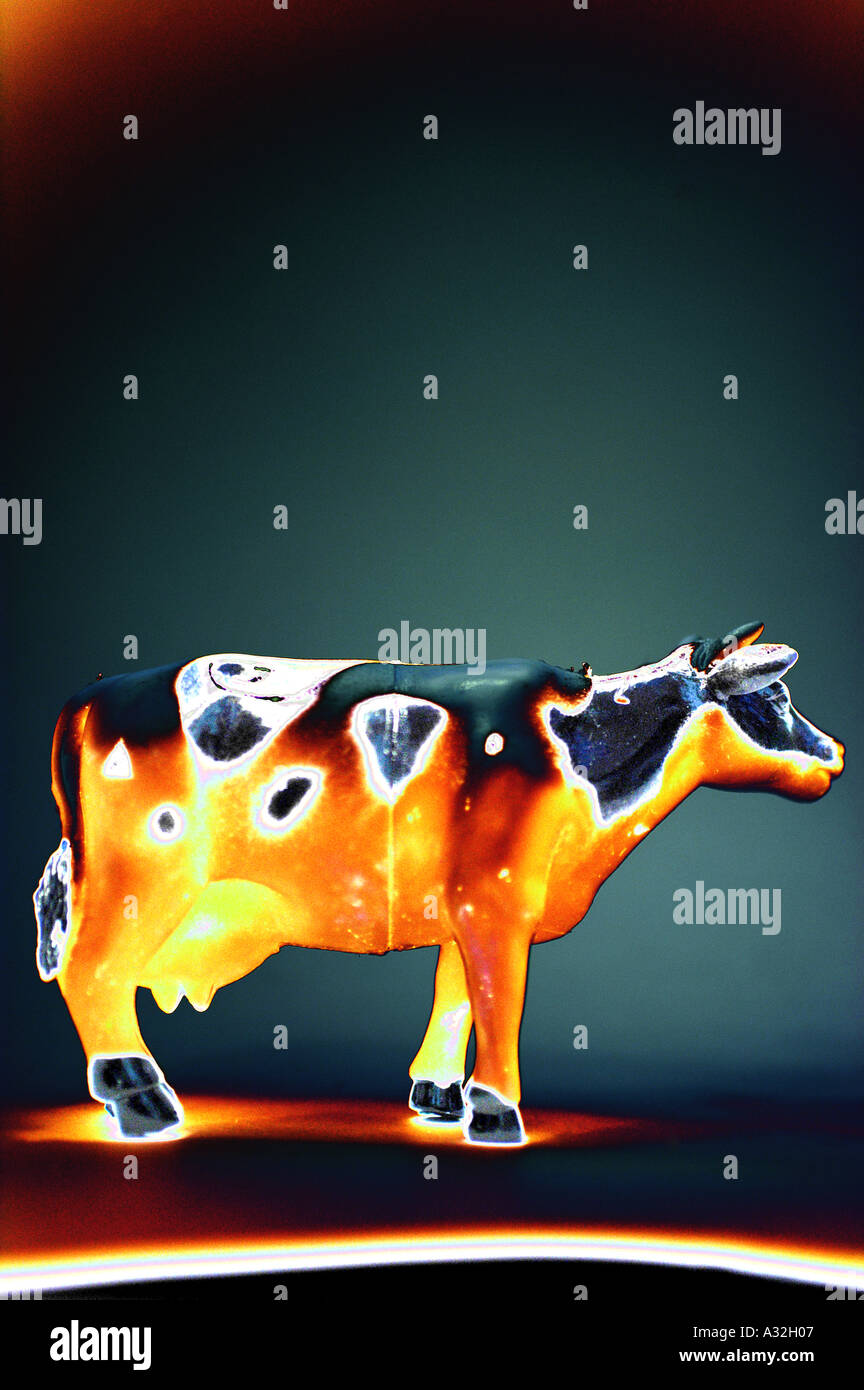 Solarized side view of a cow Stock Photo
