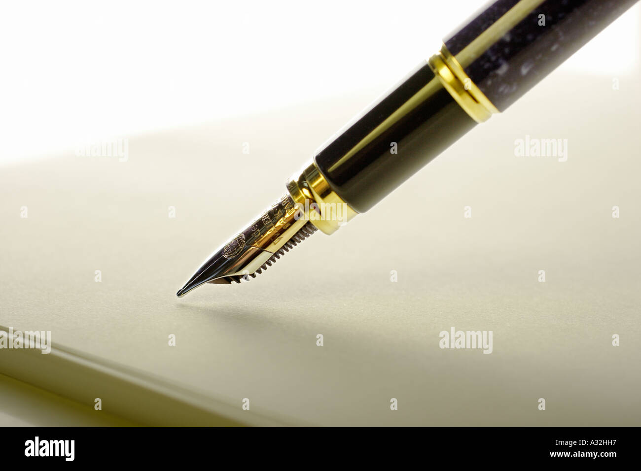 Fountain pen and paper stack detail view Stock Photo Alamy