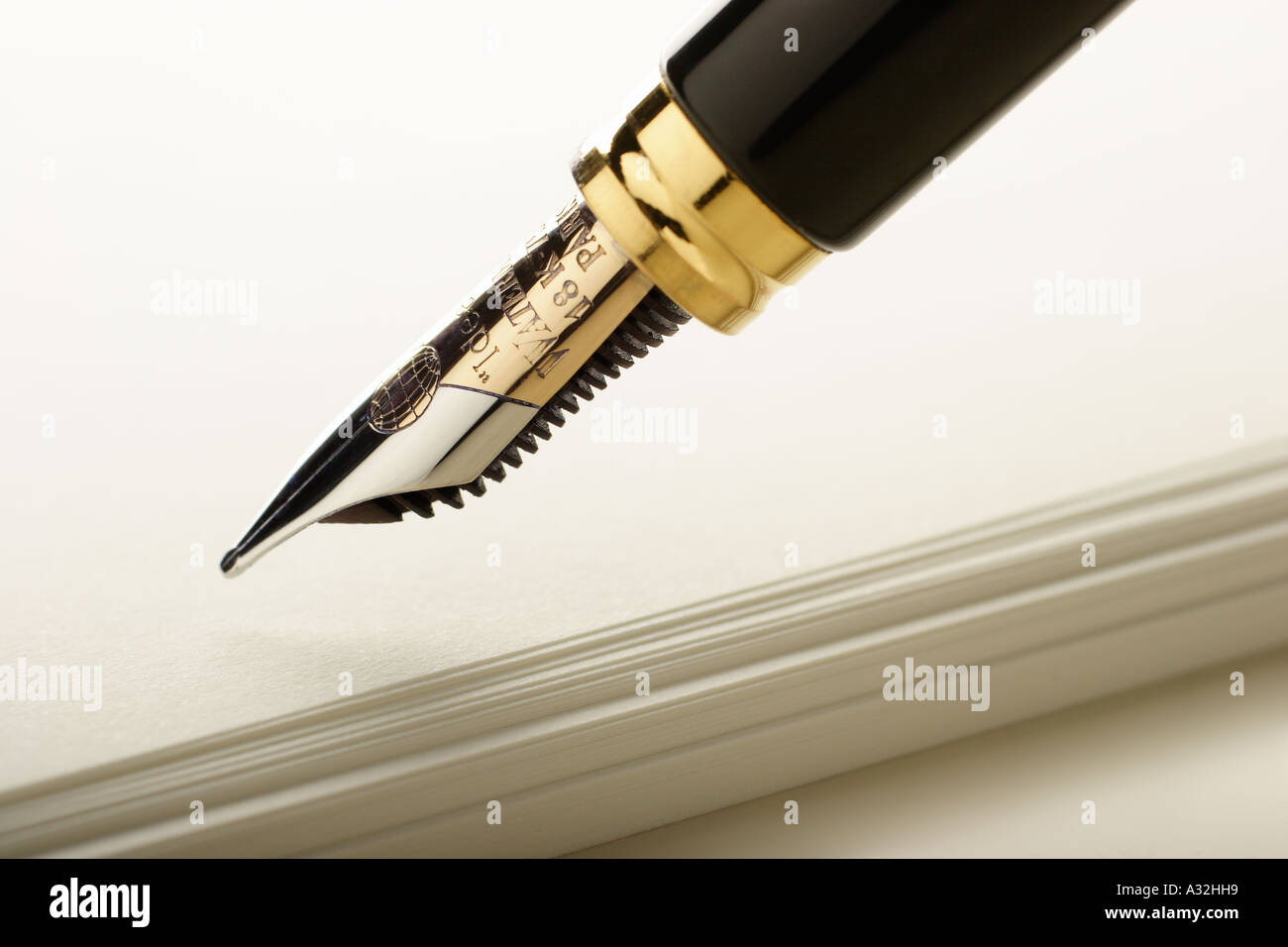 Fountain pen and paper stack detail view Stock Photo Alamy