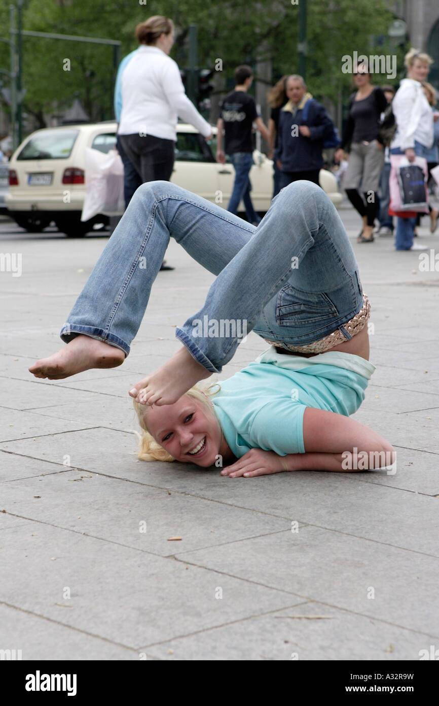 Young female street performer, Berlin, Germany Stock Photo