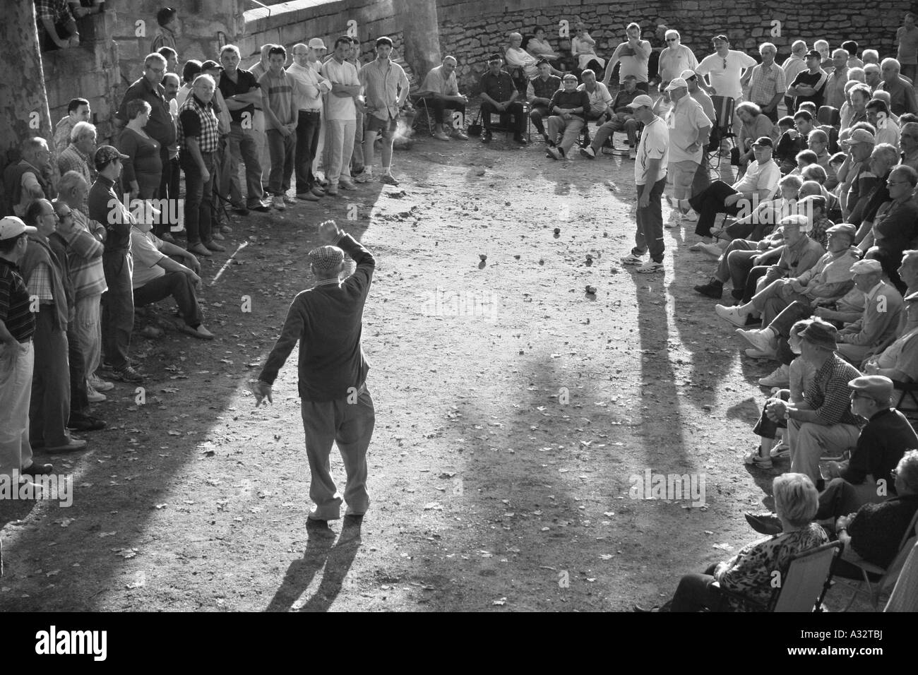 Playing Petanque in St. Remy, France. Stock Photo