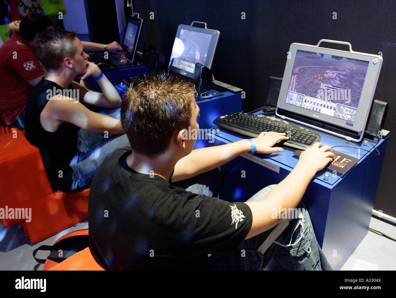 Teenagers playing strategy games at the GC Games Convention 2005 in