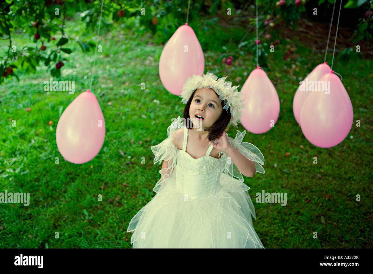 Bridesmaid with pink balloons Stock Photo