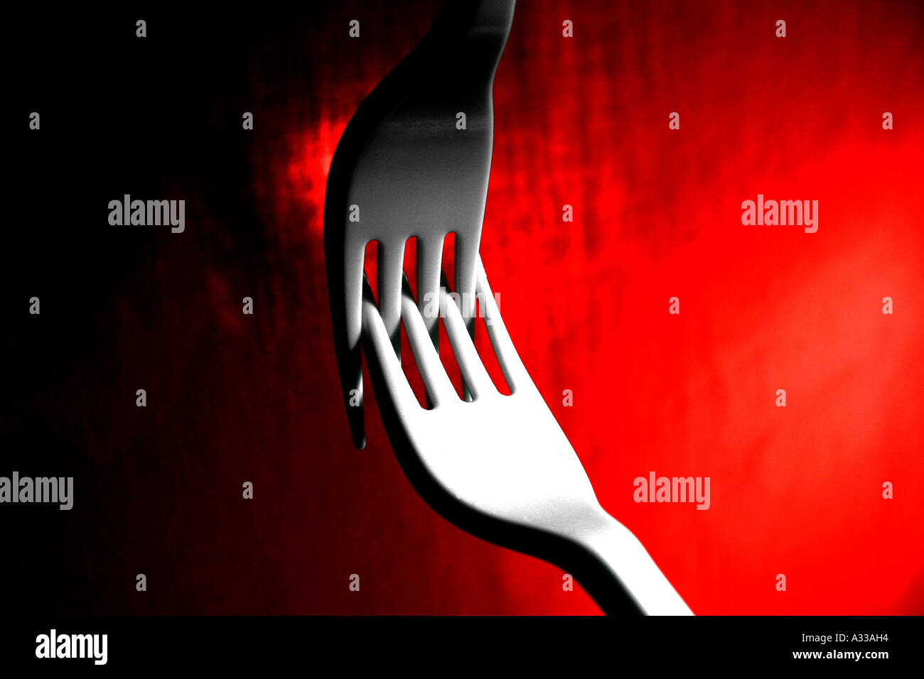 Two forks joined hi-res stock photography and images - Alamy