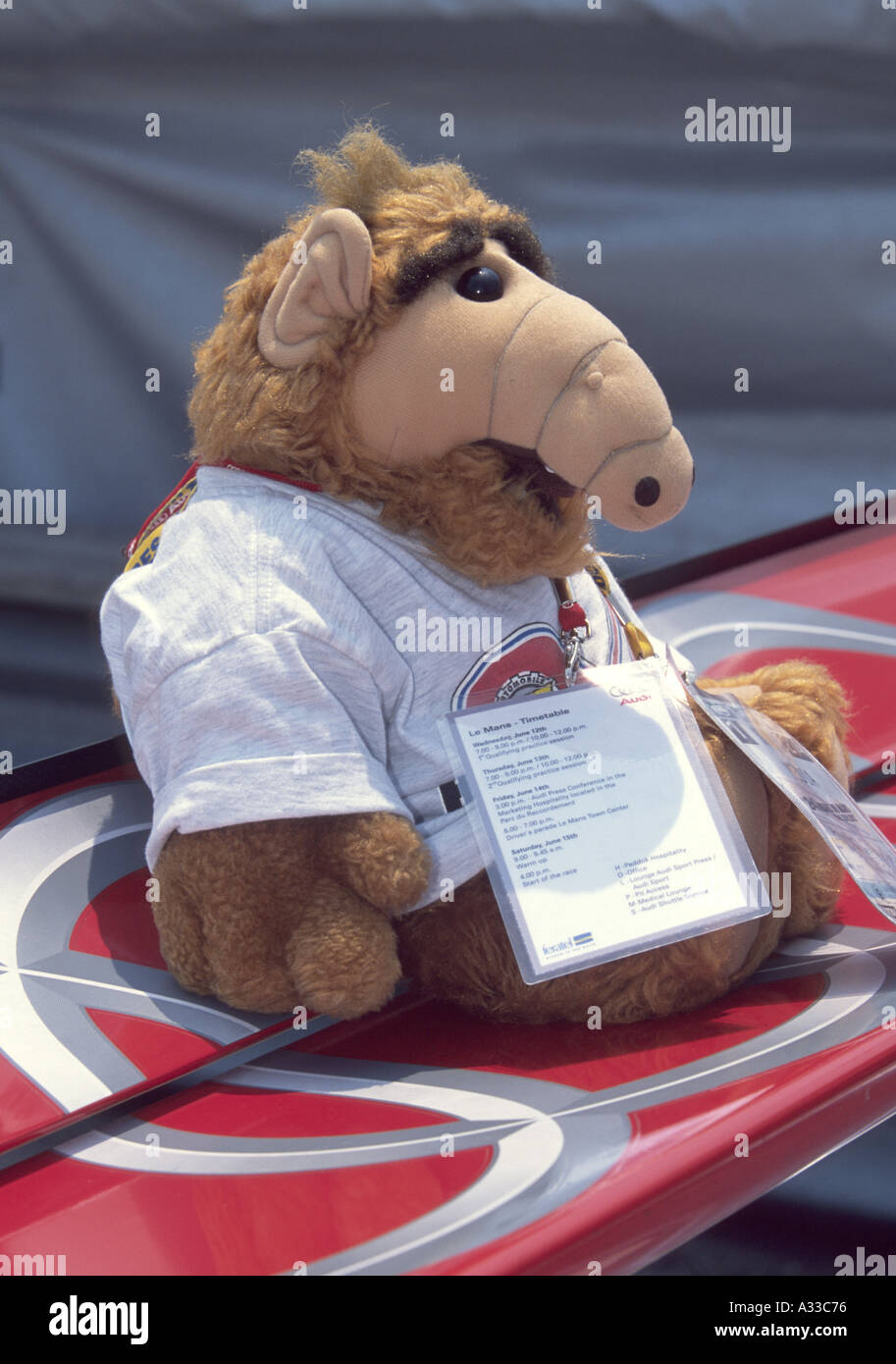 Television character ALF sits on the rear wing of an Audi R8 at the Mid Ohio ALMS race 2002 Stock Photo