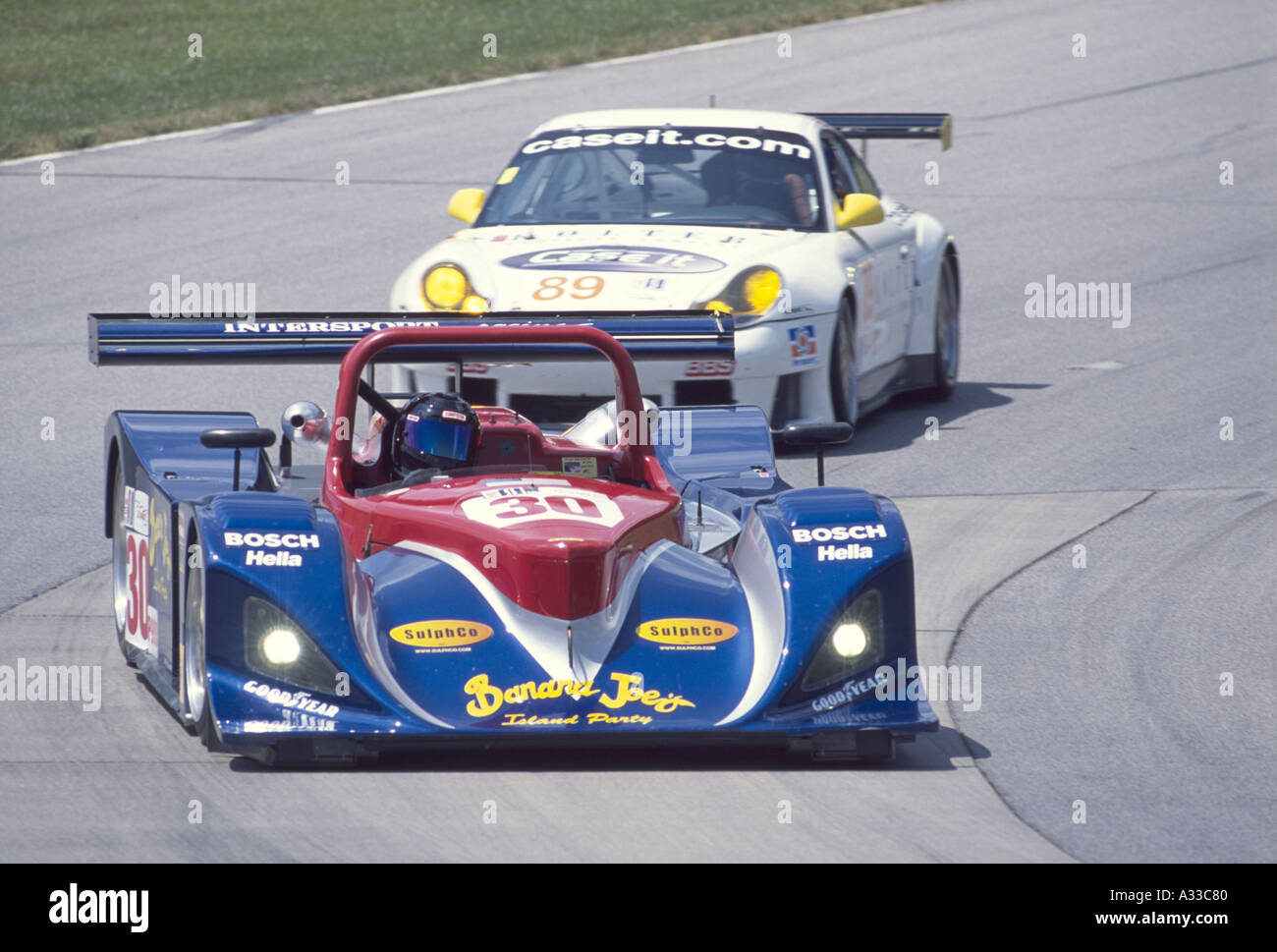 Clint and Joel Fields Intersport Lola B2K Judd turns into the esses at Mid Ohio Stock Photo