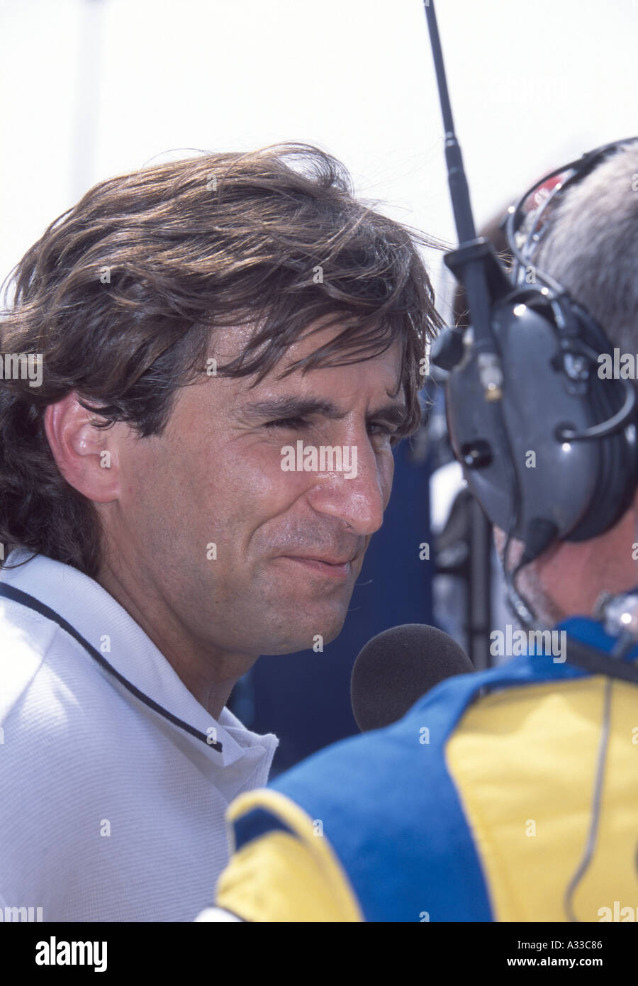 Alex Zanardi is interviewed during his visit to the Molson Indy Toronto 2002 Stock Photo