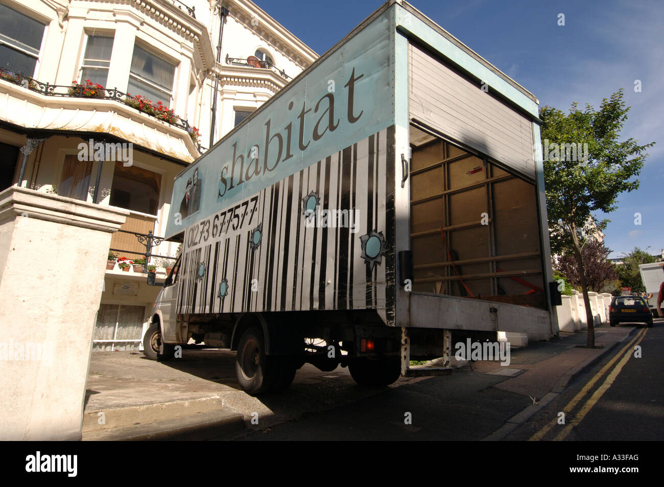 A Shabitat furniture van which collects and delivers recycled goods taking the micky out out of furnishing store Habitat Stock Photo