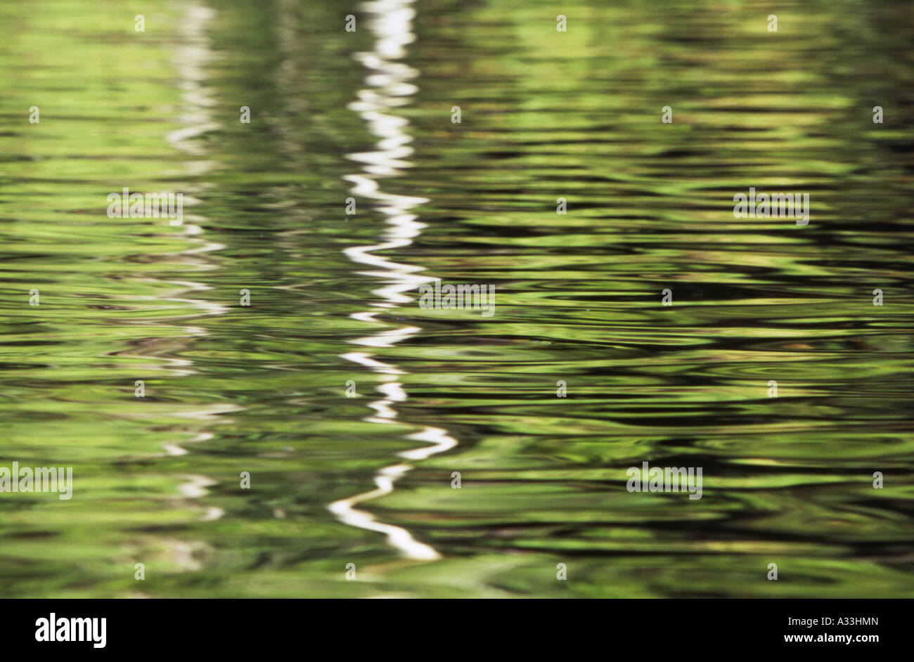 Reflections on Rippled water surface at Wangi Falls plunge pool Litchfield National Park Northern Territory Australia Stock Photo