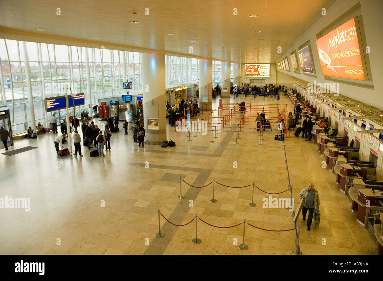 Check in desks at John Lennon Airport Liverpool Stock Photo - Alamy