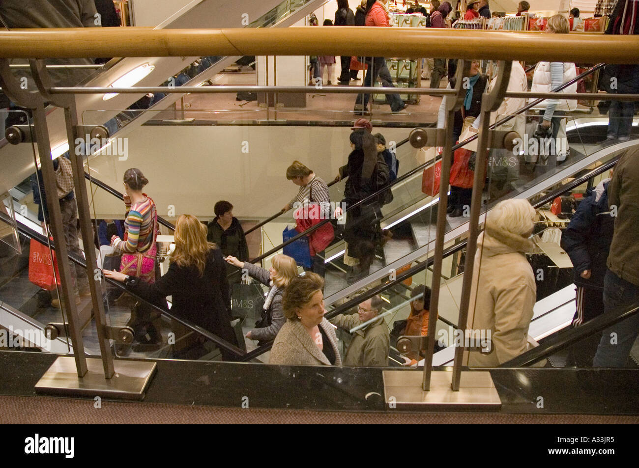 Shoppers on department store escalators during the sales Dublin