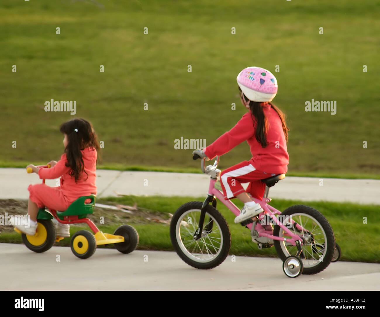 Family Sisters Bicycle Riding Stock Photo Alamy