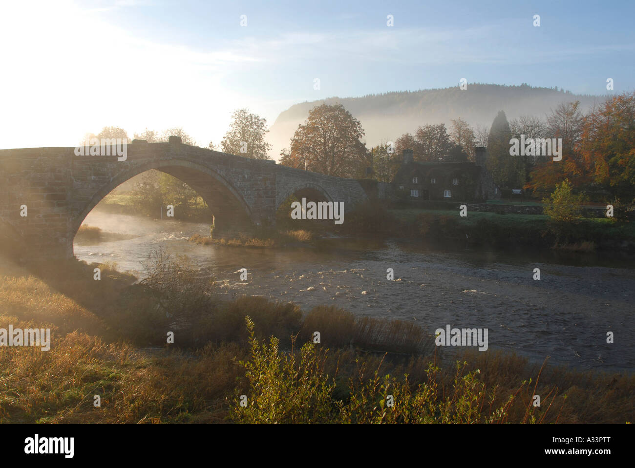 Stone Bridge over River Conwy and Tu Hwny i r Bont Stone House Llanrwst North East Wales Stock Photo