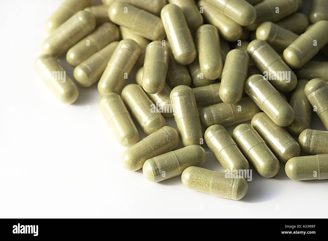 pile of capsules on white Stock Photo