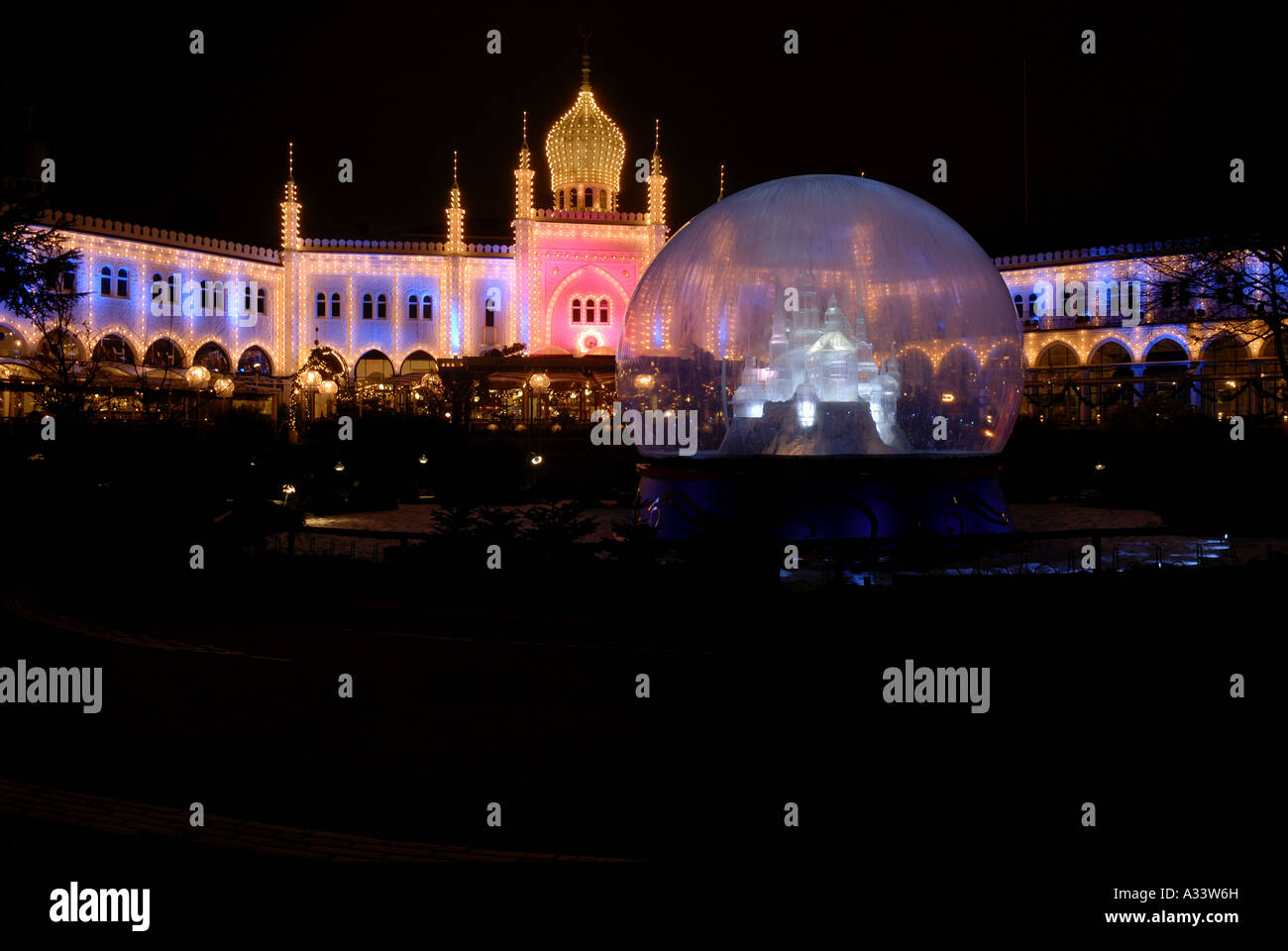 Glass sphere and Raj palace at Copenhagen Tivoli Gardens park Denmark ...