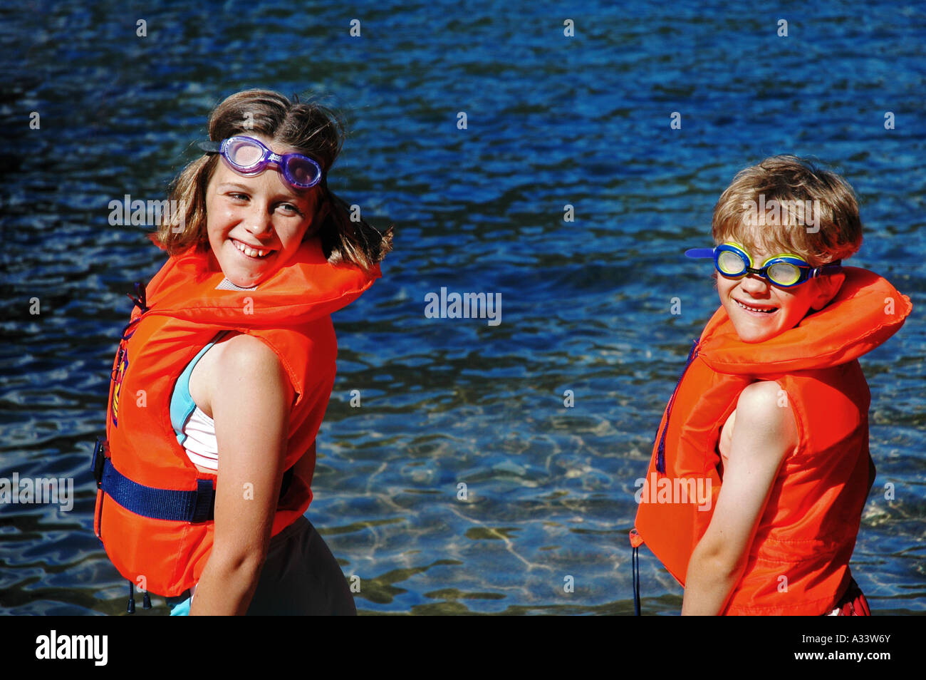 Wearing lifejackets or life jackets hi-res stock photography and images ...