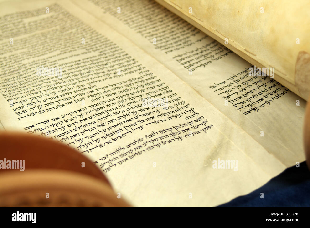Torah scroll showing Hebrew script Stock Photo