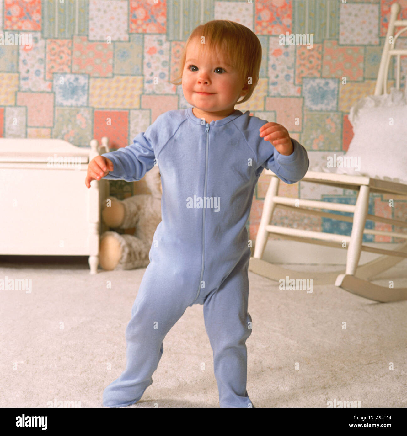 Baby boy wearing blue pajamas hires stock photography and images Alamy
