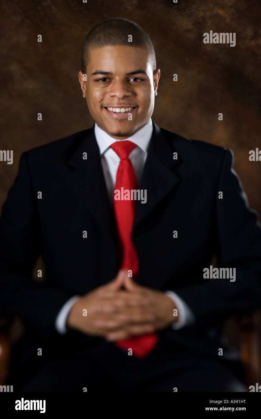 portrait of a young african american man in a suit Stock Photo - Alamy