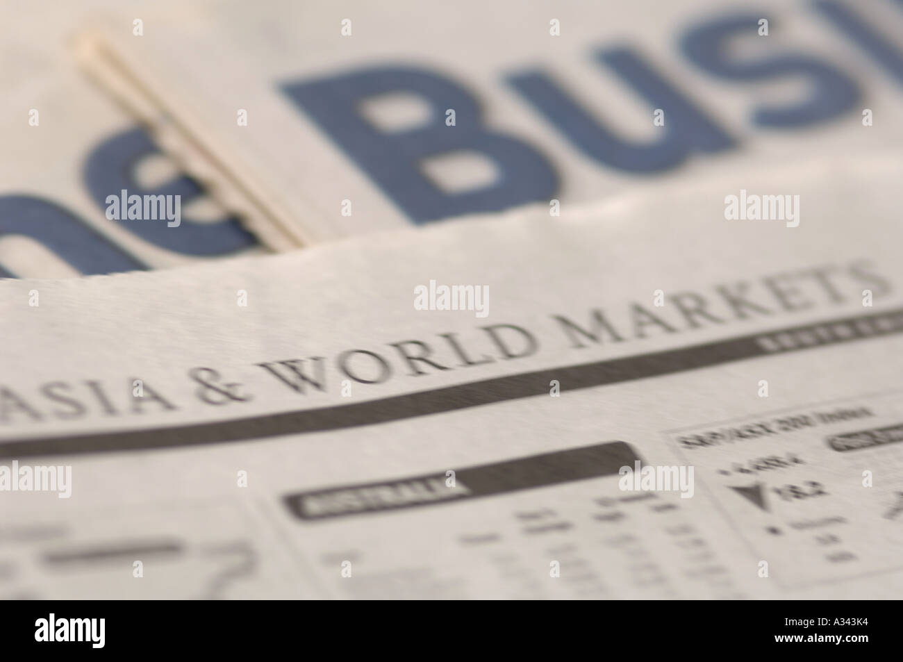 business newspaper with world market charts Stock Photo
