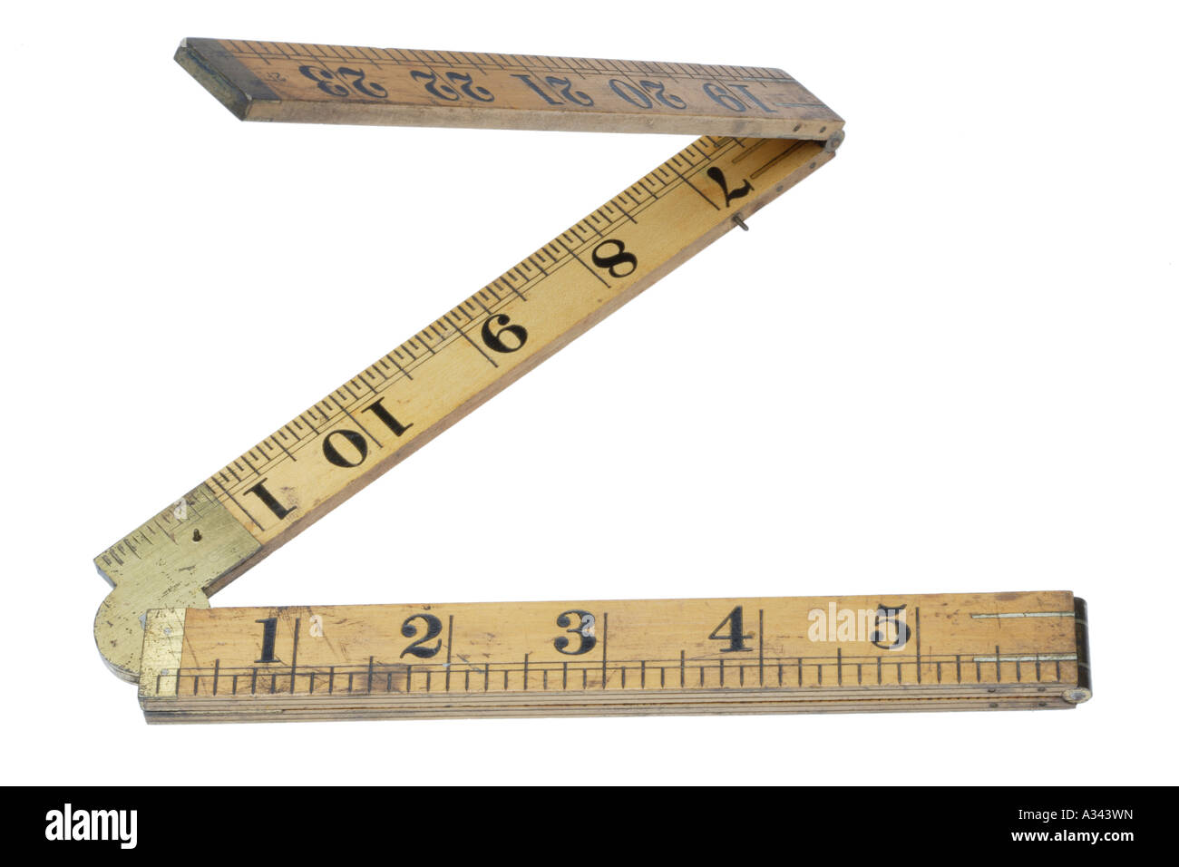 Folding wood measuring ruler Brass hinges Letter Z Stock Photo