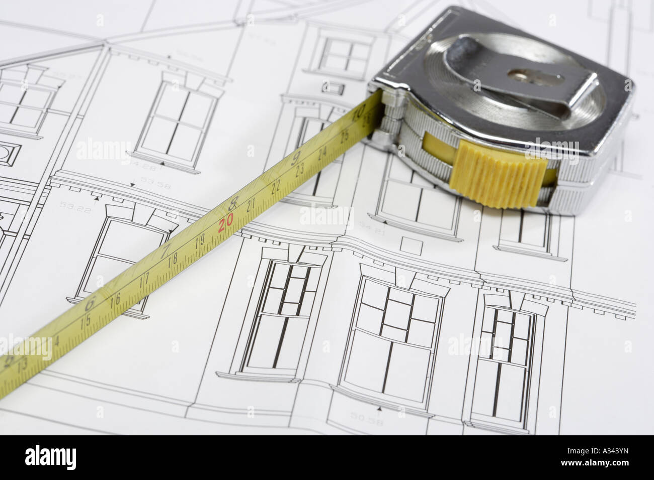 Tape measure on Architects technical drawings Stock Photo Alamy