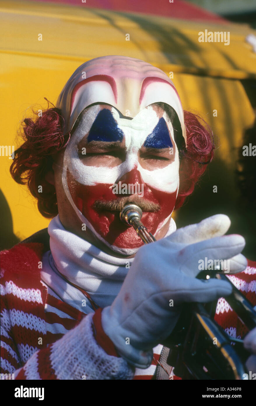 A band member in the festival in Cologne, Germany, is made up as a clown  Stock Photo - Alamy
