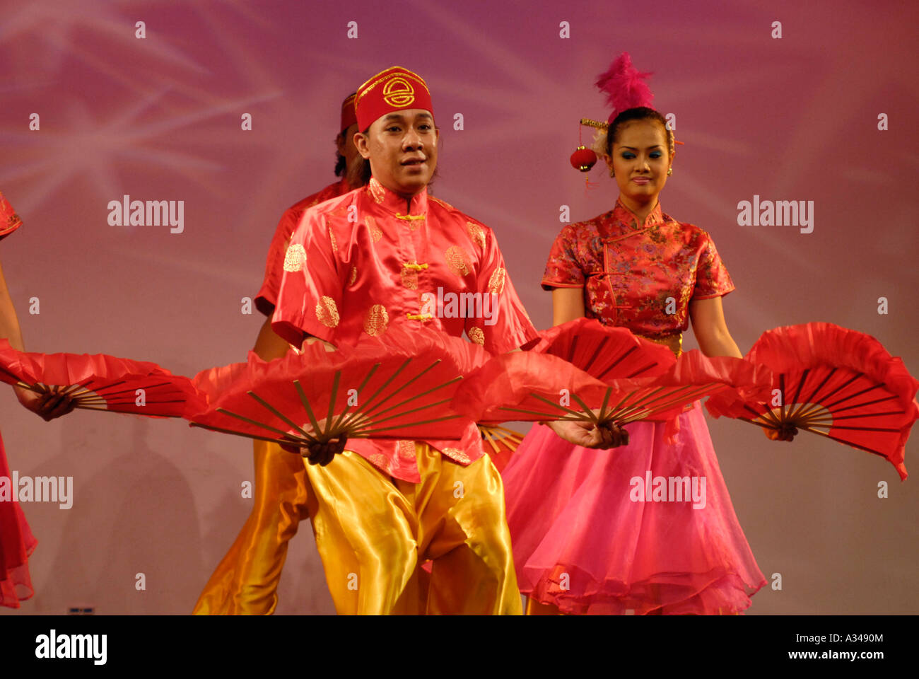 Dancers performing a Chinese fan dance, Kuala Lumpur, Malaysia Stock