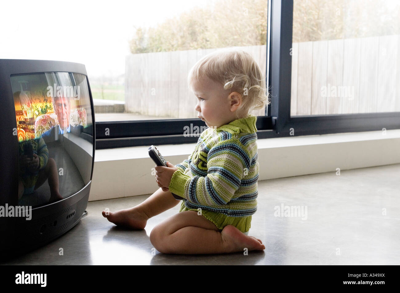 Little Boy Watching Tv Stock Photo Alamy