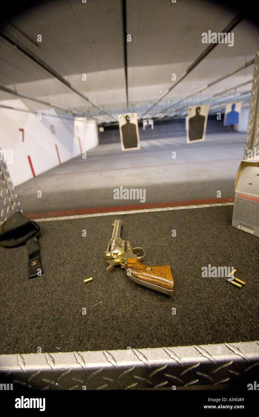 American indoor gun shooting range Male shooter at target practice Las
